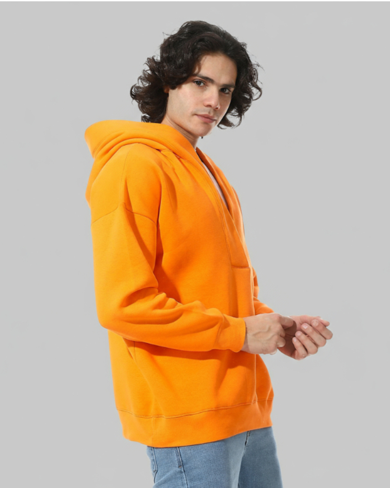 An orange hoodie with a modern cut from Defect