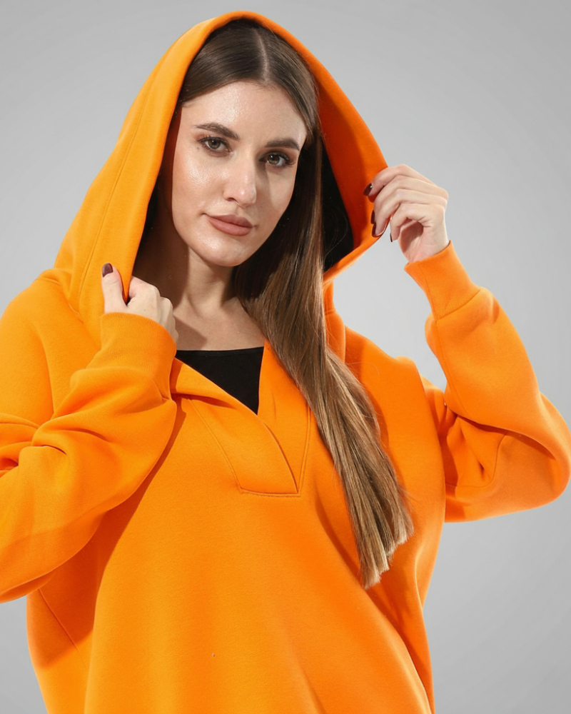 Orange hoodie with a modern cut from Defect