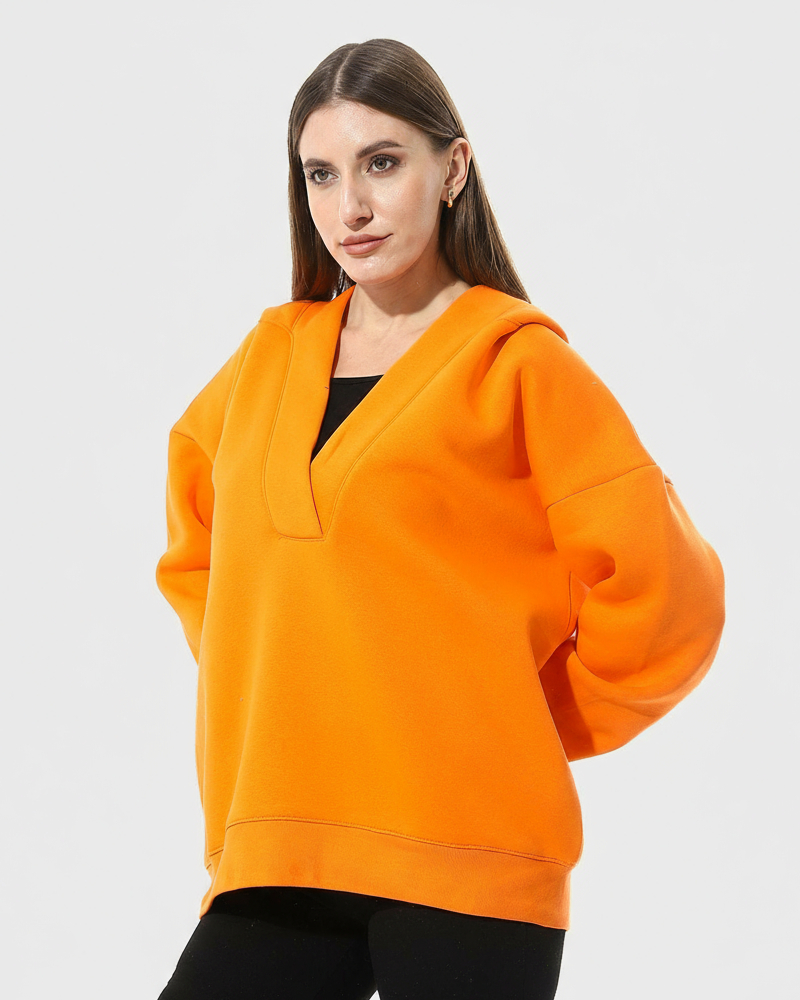 Orange hoodie with a modern cut from Defect